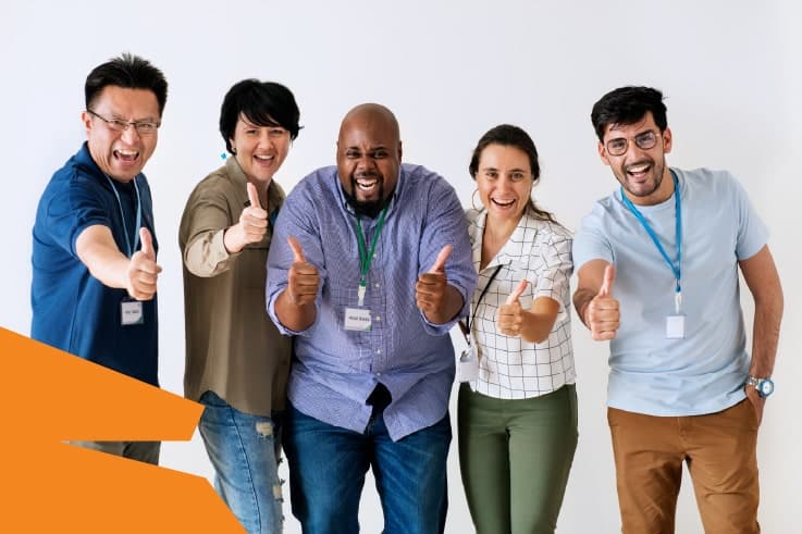 A group of diverse people with thumbs up because of great web design
