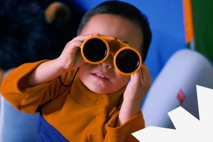 A child with binoculars looking to see what logos mean for your brand