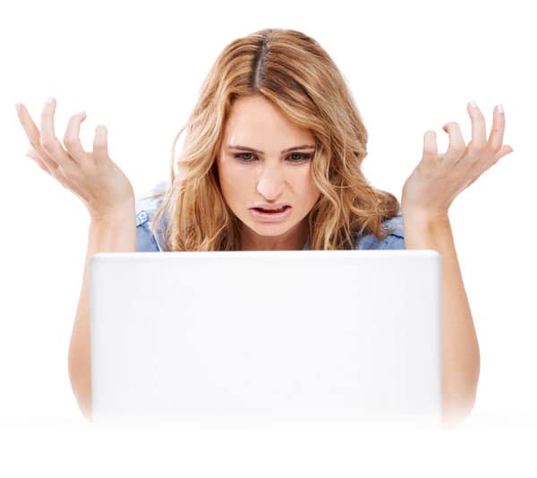 woman looking at her computer screen wondering why her website is not appearing on Google